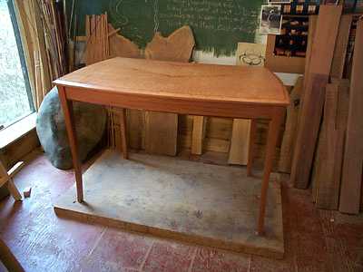 Image showing the curved pearwood desk